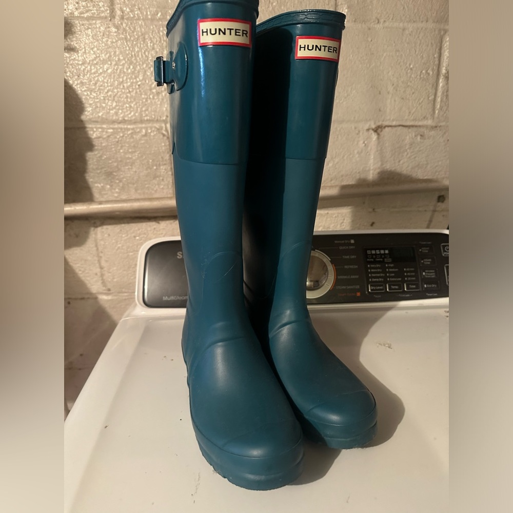 Hunter rain boots.